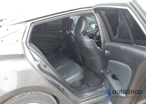 2021 Toyota Prius Prime Limited из США, поврежденный, VIN JTDKAMFP3M3179446